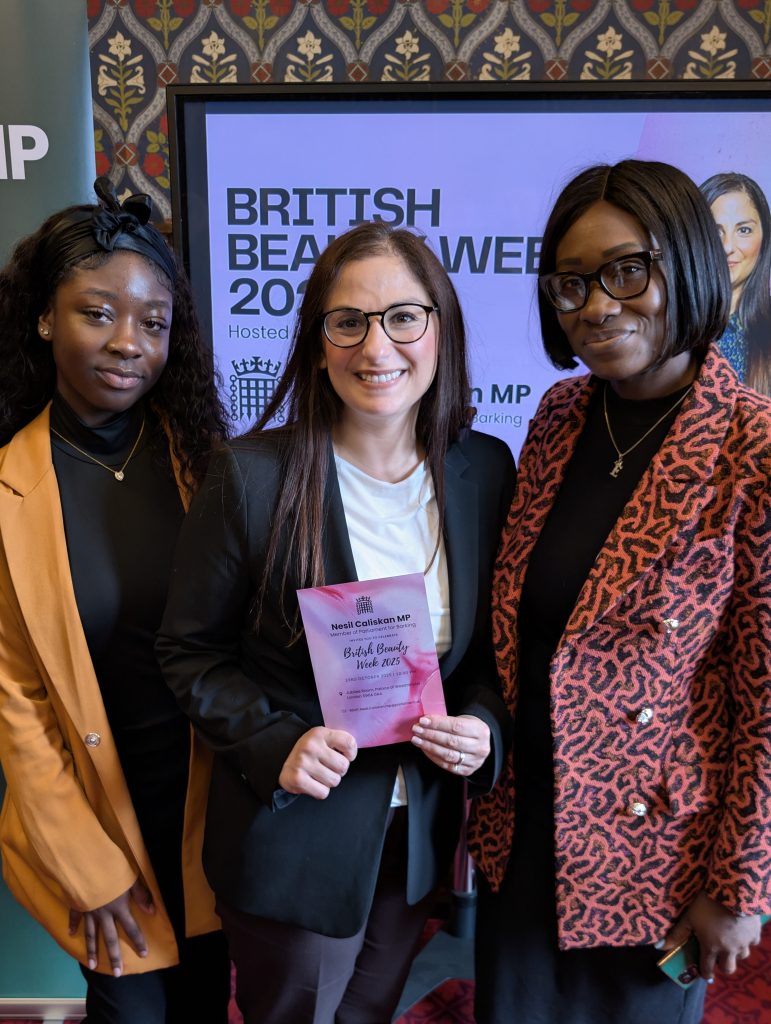 Nesil Caliskan, Barking MP, with Erica Brobbey, owner of Empress Hair & Beauty - a business in Barking - and her daughter Tiana at a reception in Parliament.